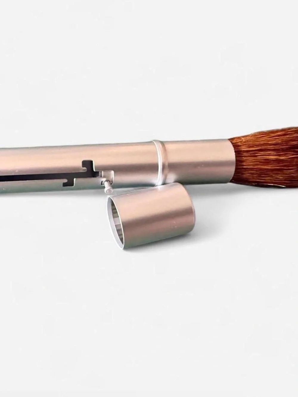 I.d. Bare Escentials retractable travel makeup Brush.